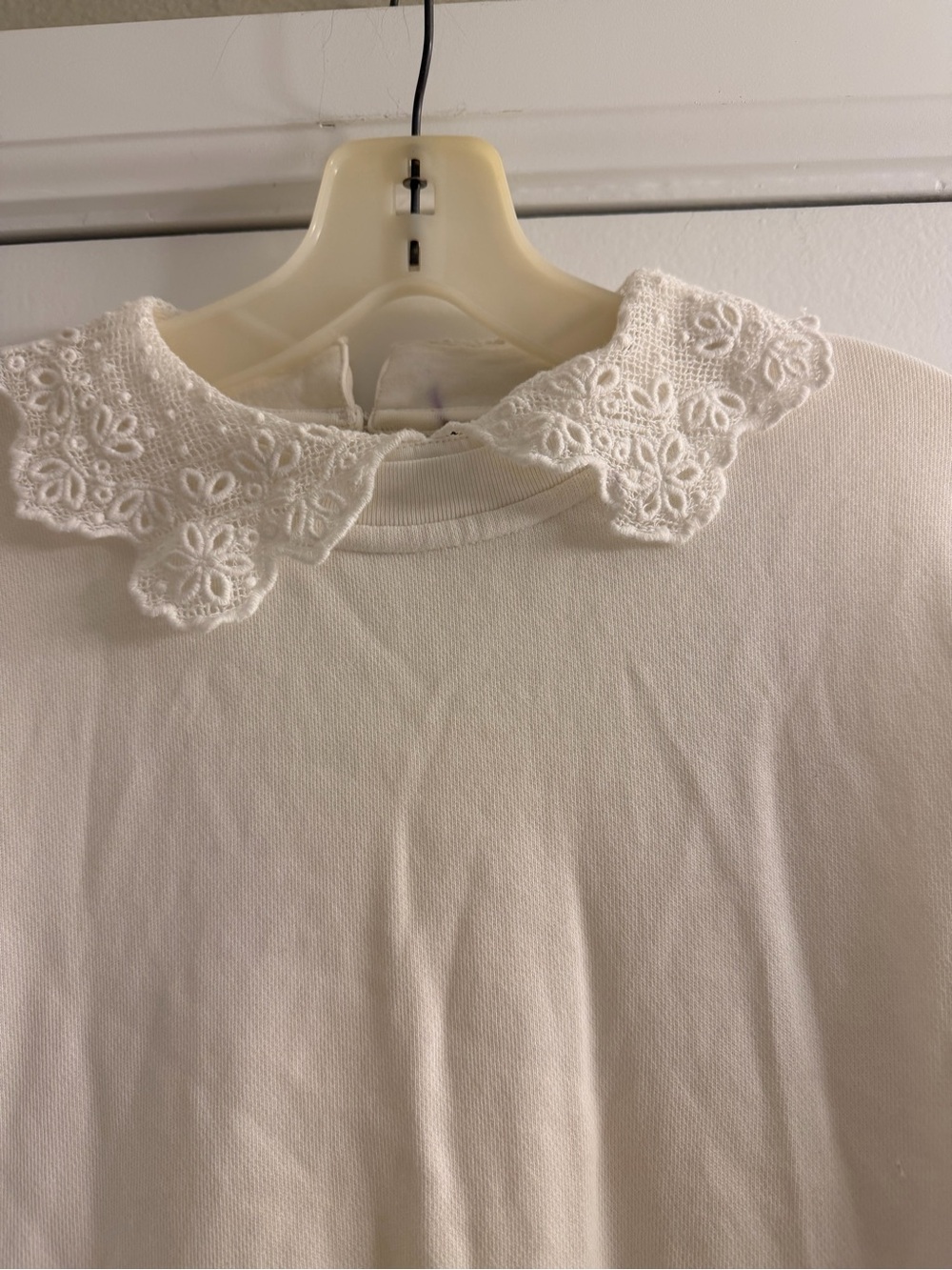 Womenβs White Top with Embroidered Peter Pan Collar